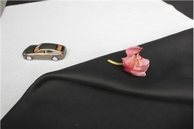 PUレザーの単層ニットバッキングと多層ニットバッキングの性能の違いは何ですか?